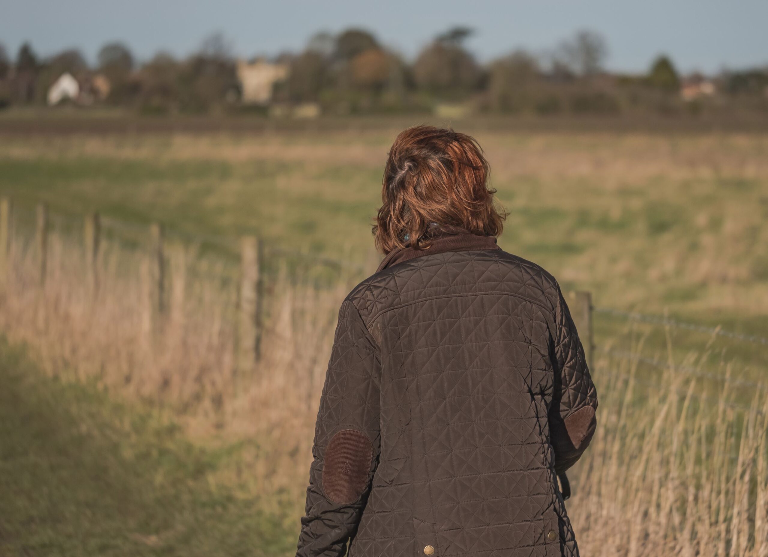 woman walking near land